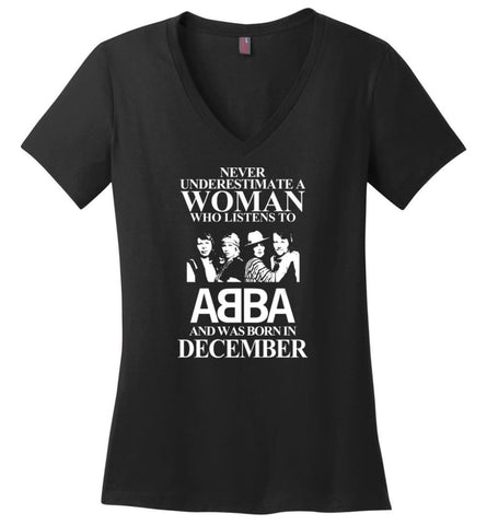 Never Underestimate A Woman Who Listens To ABBA And Was Born In December - Ladies V-Neck - Black / M - Ladies V-Neck